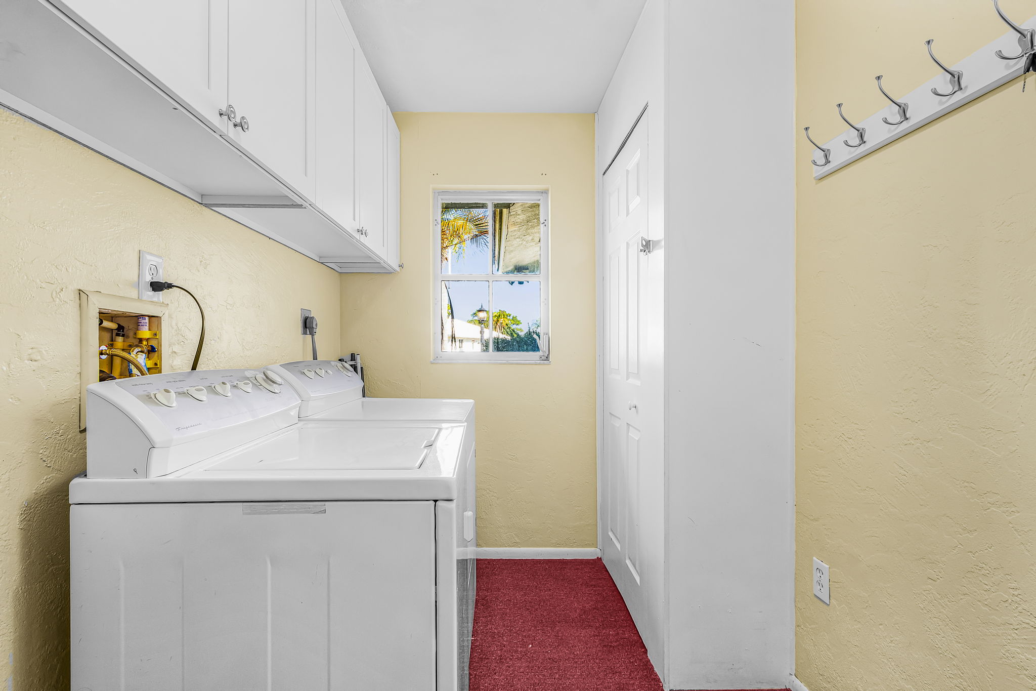 Laundry room with washer and dryer