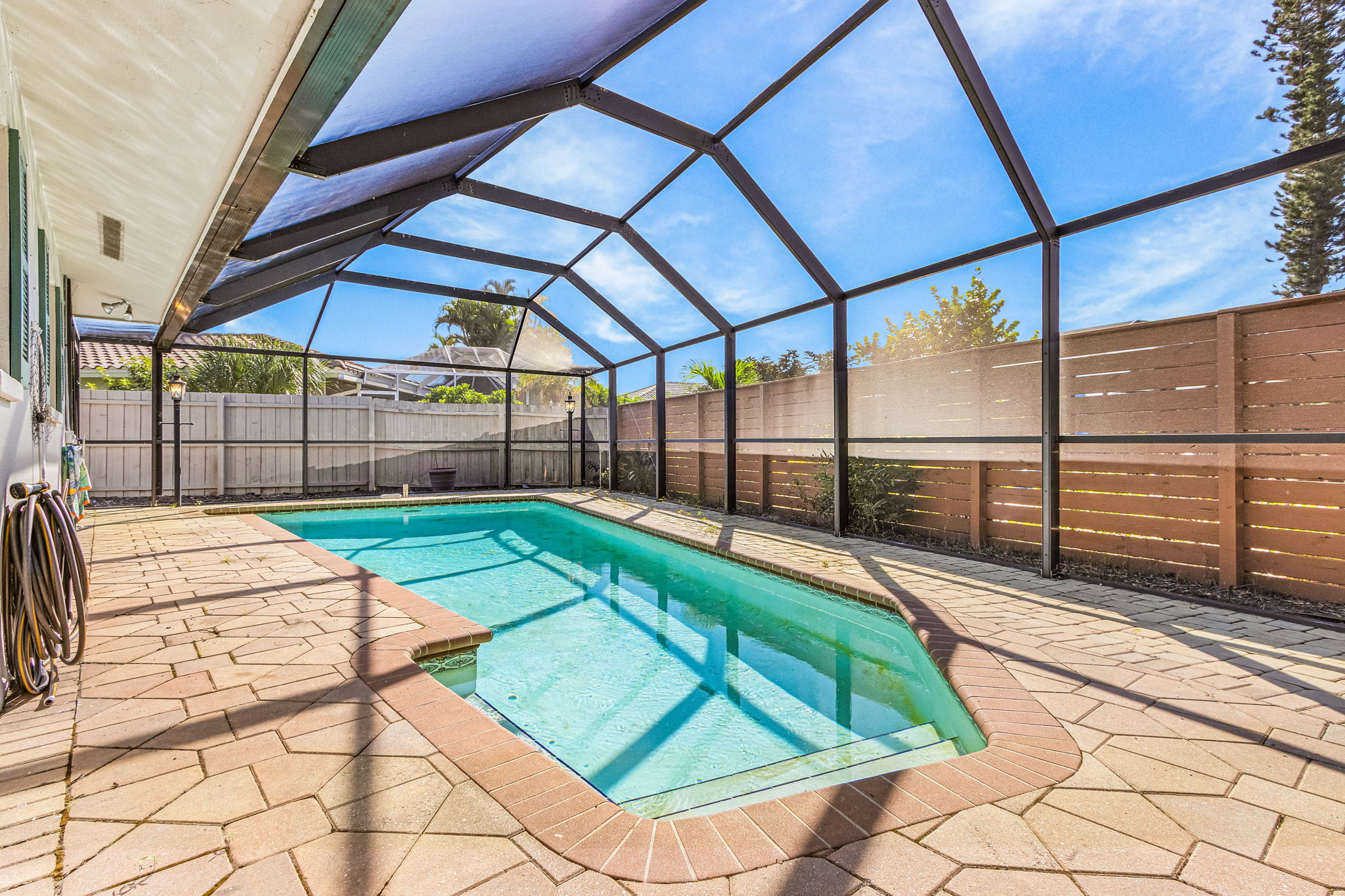 Private pool inside the screened enclosure